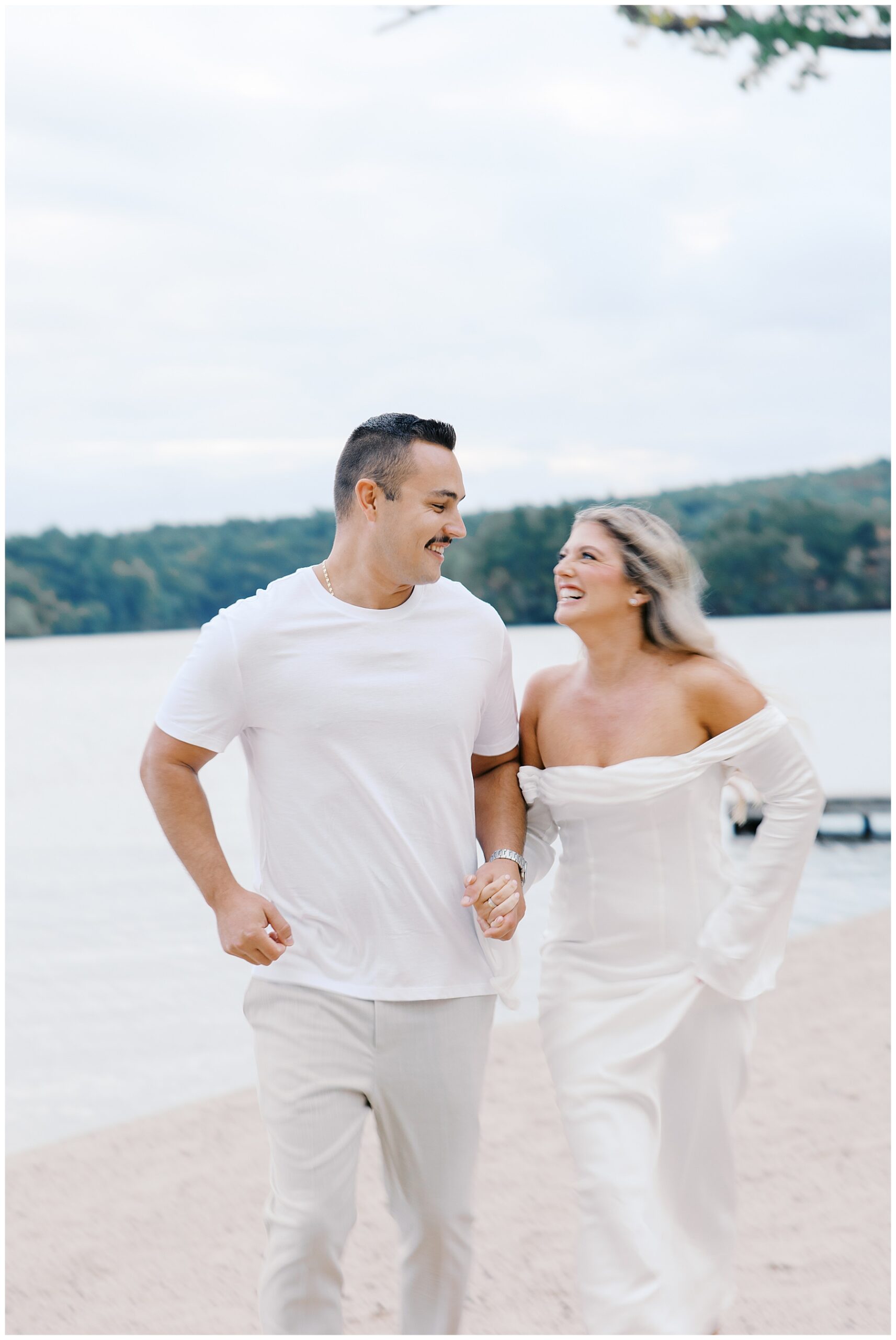 candid engagement photos at Lake Pearl Wrentham
