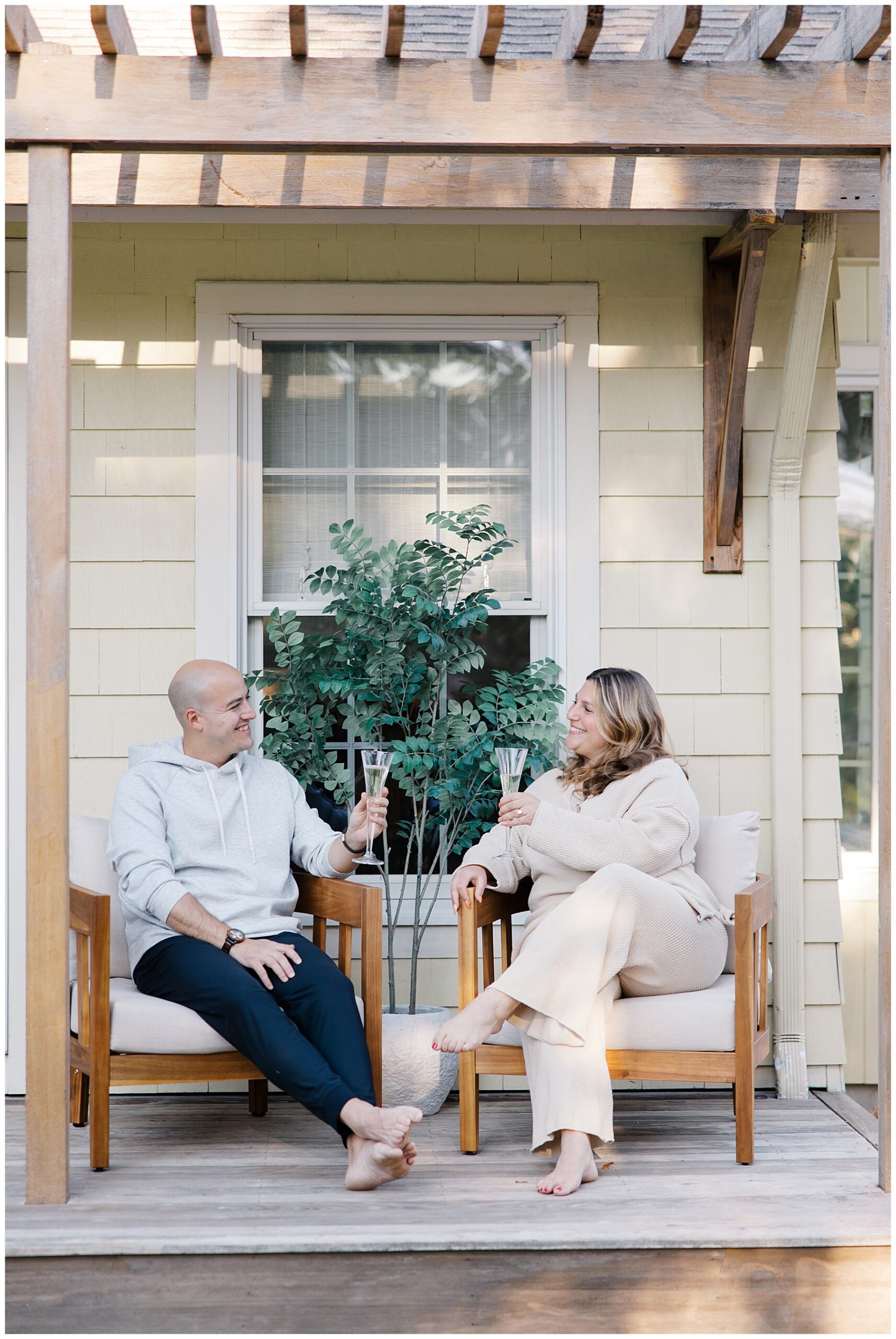 surprise proposal at couples home ends with champagne toast