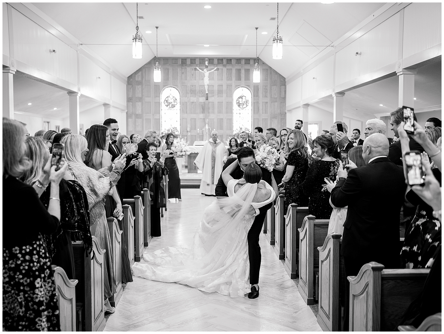 newlyweds kiss at wedding ceremony 