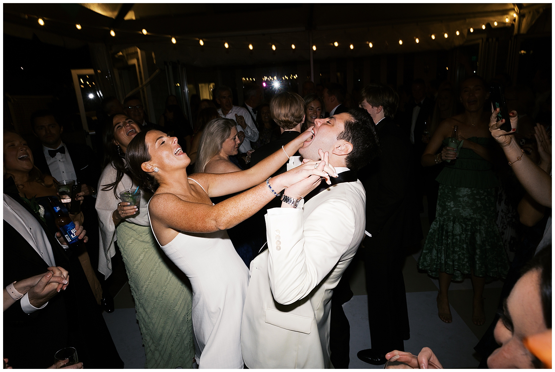 candid portraits of bride and groom on dance floor 