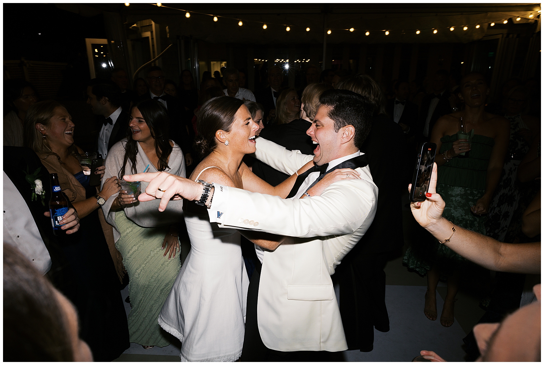 candid portraits of bride and groom singing and dancing 