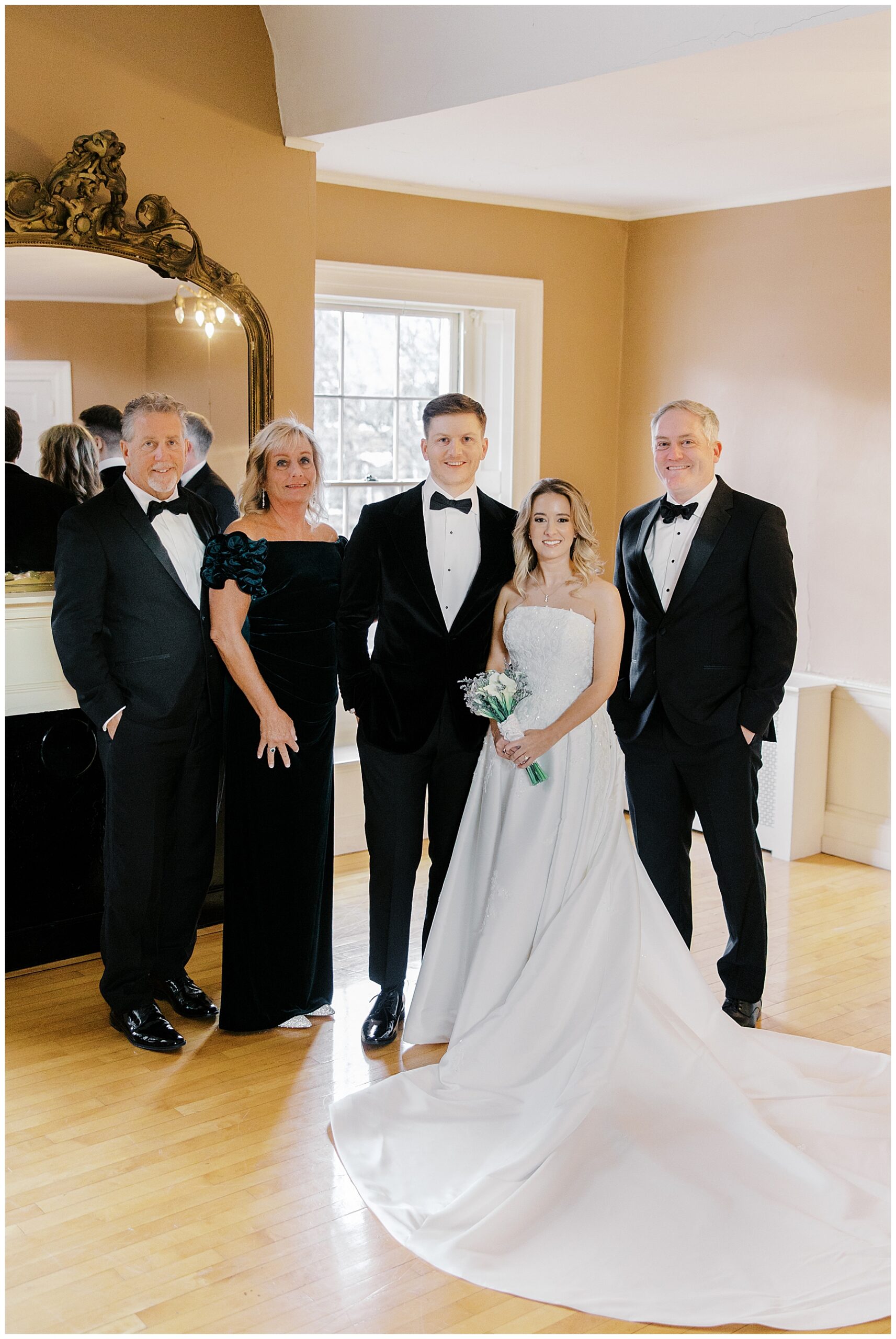 bride and groom with family