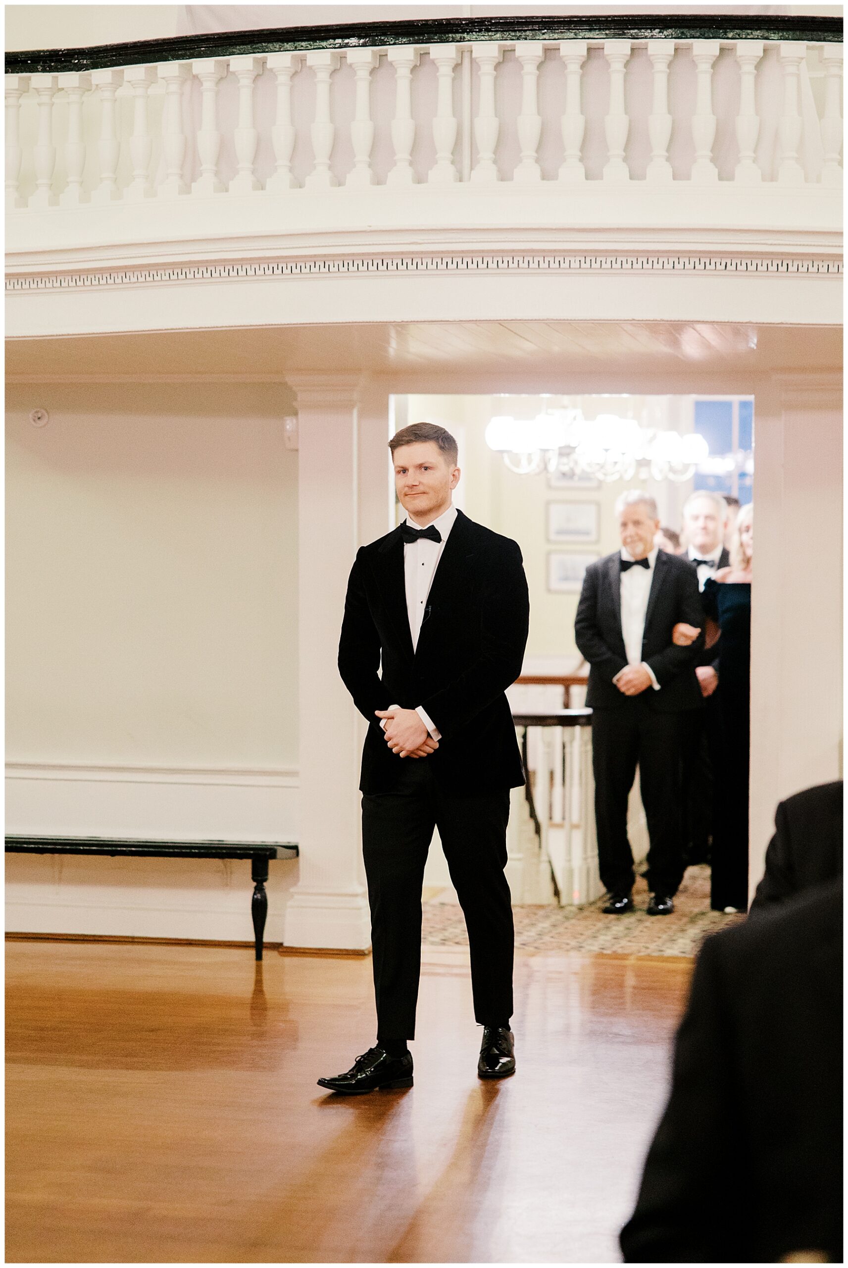 groom walks into ceremony