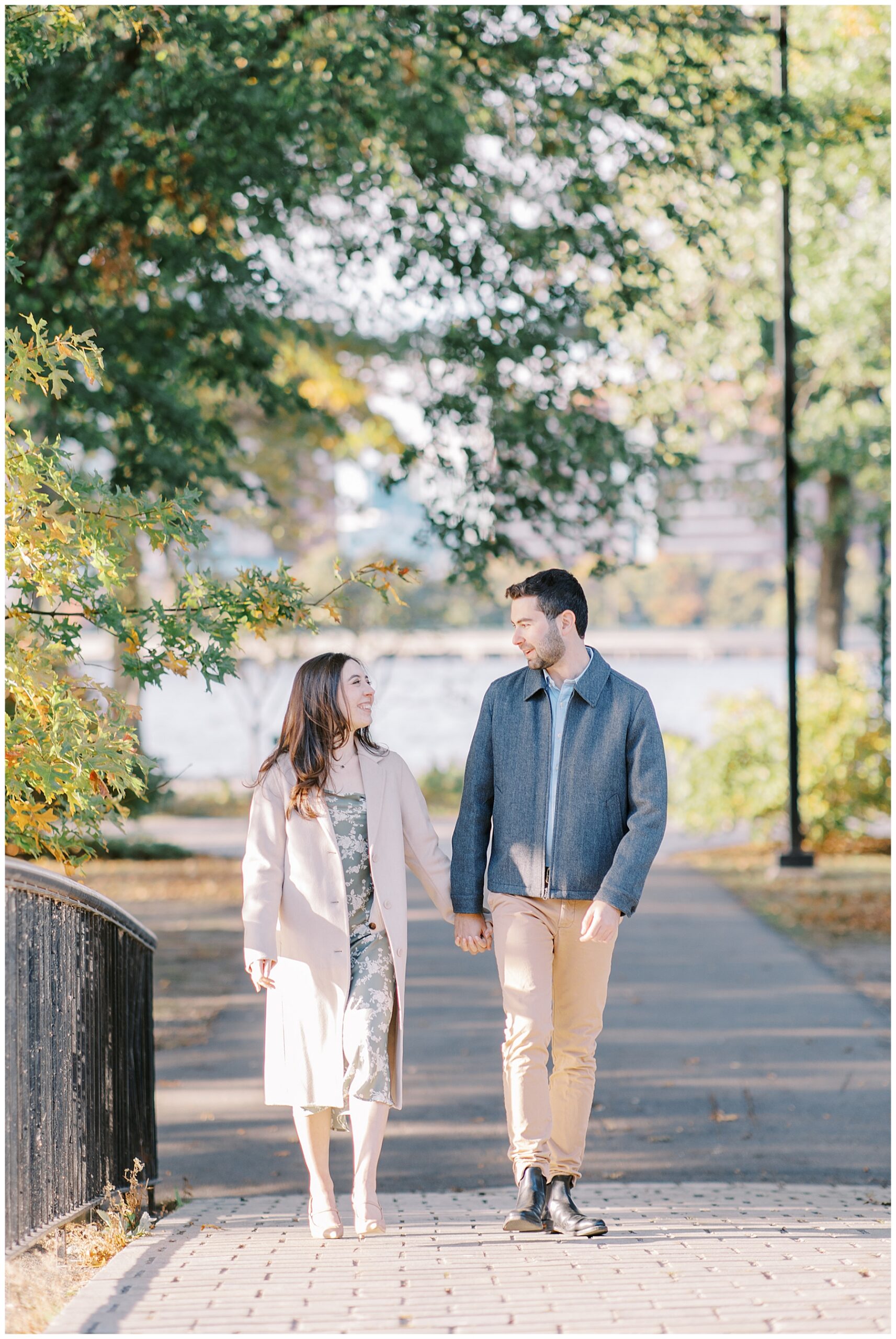 couple walk together by the water