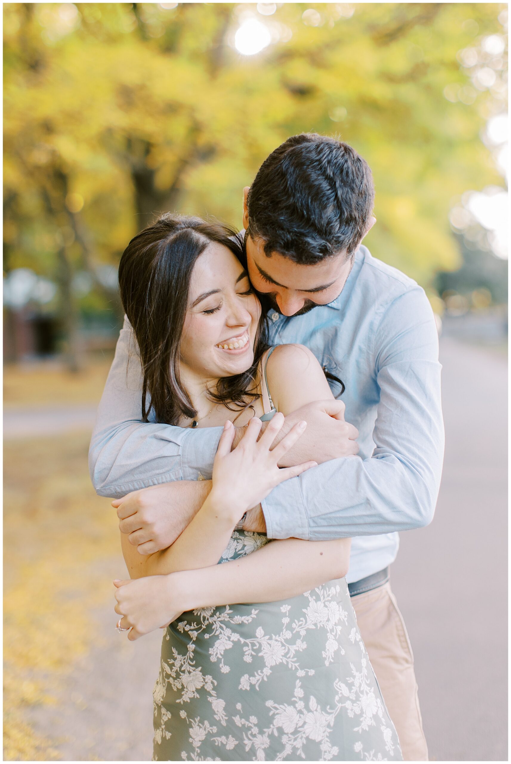 intimate engagement portraits with fall foliage in the background 