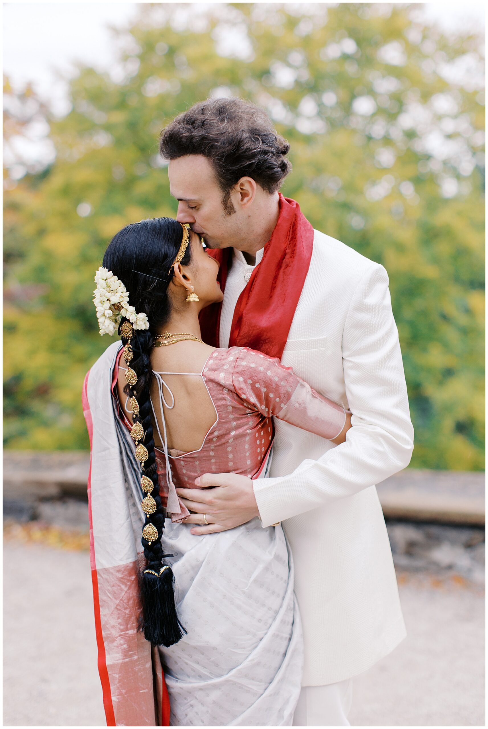 bride and groom embrace