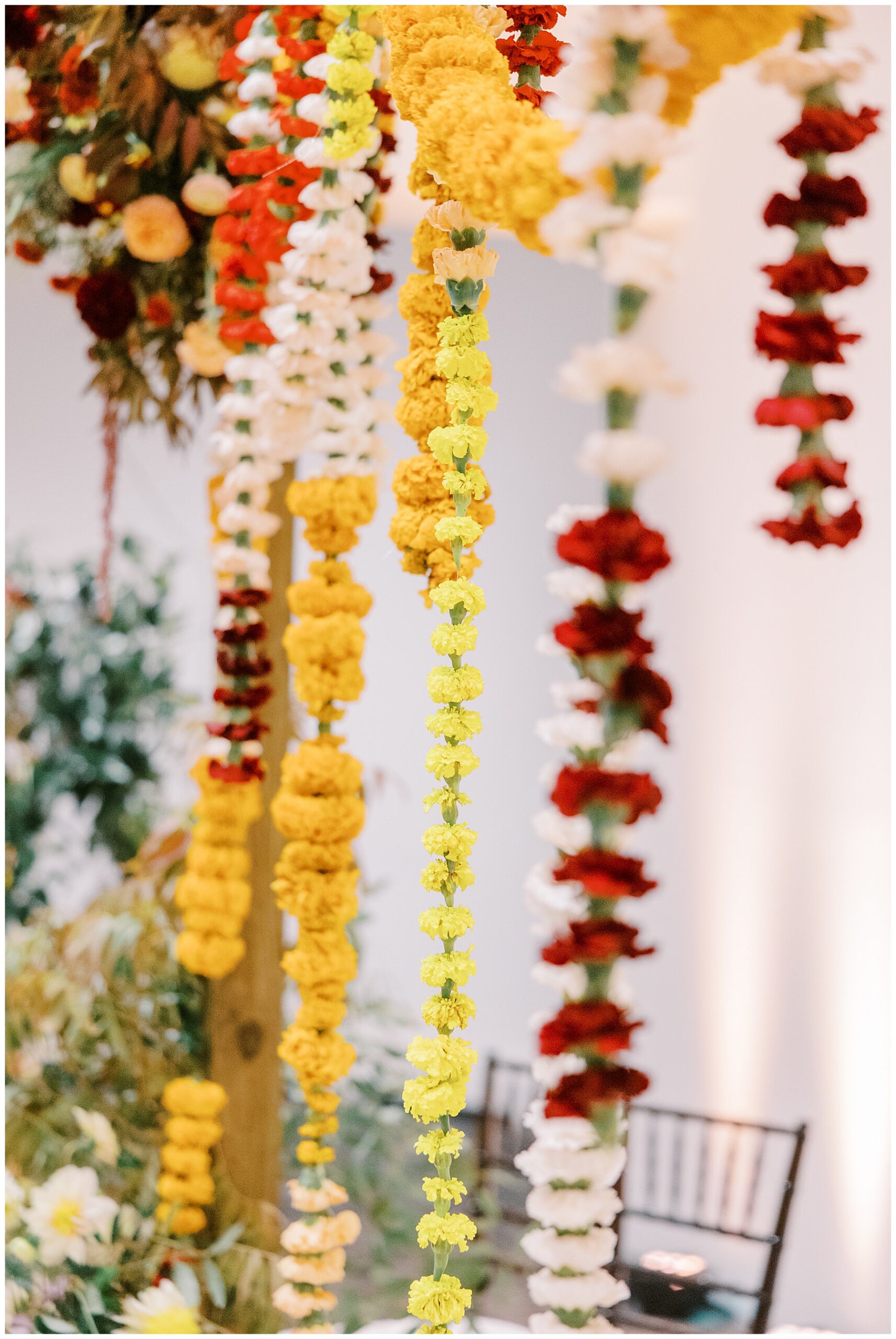 colorful flowers decorate ceremony space