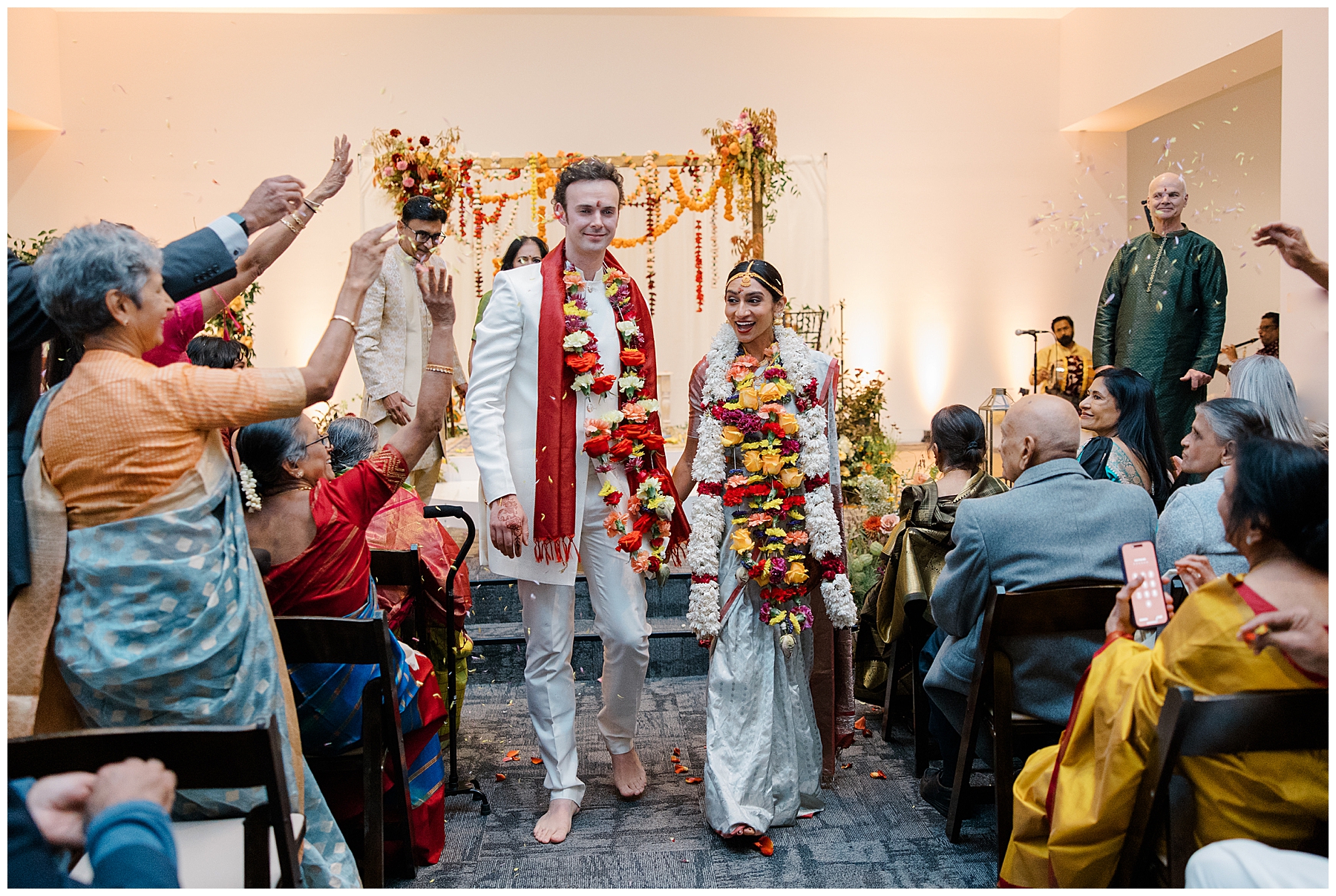 Bride and groom exit wedding ceremony