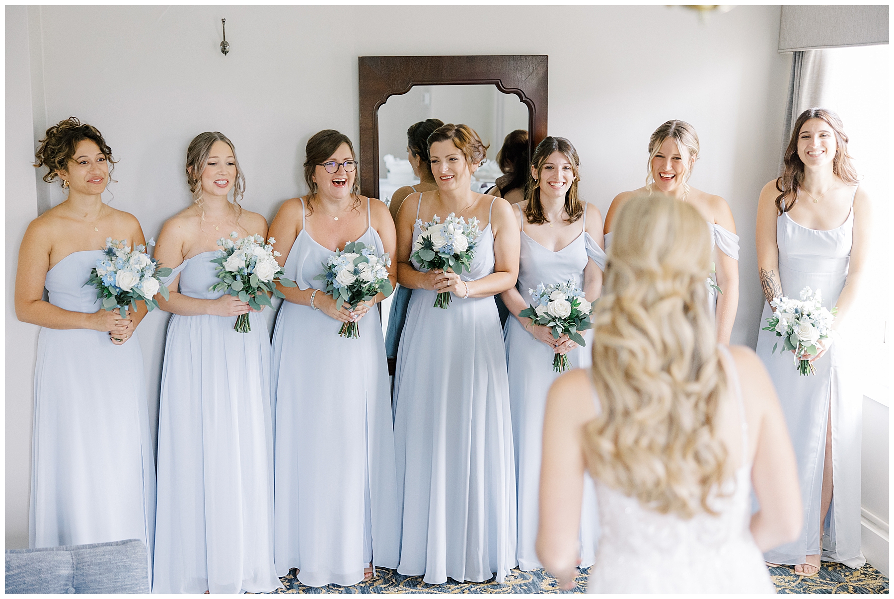 bride's first look with bridesmaids 