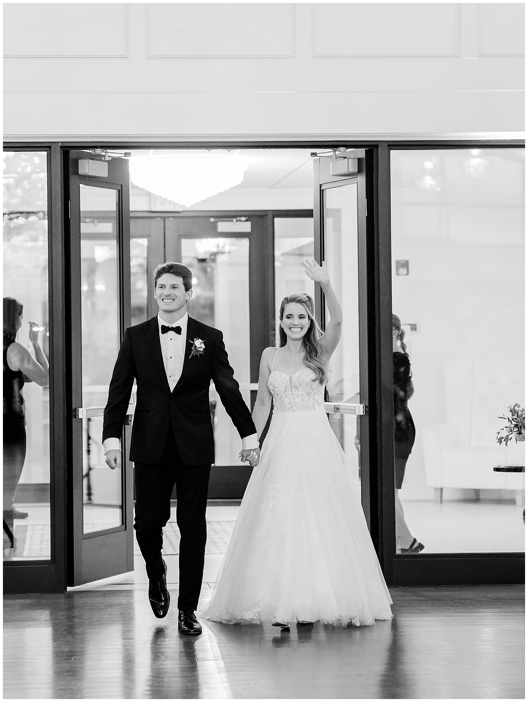 newlyweds enter reception 