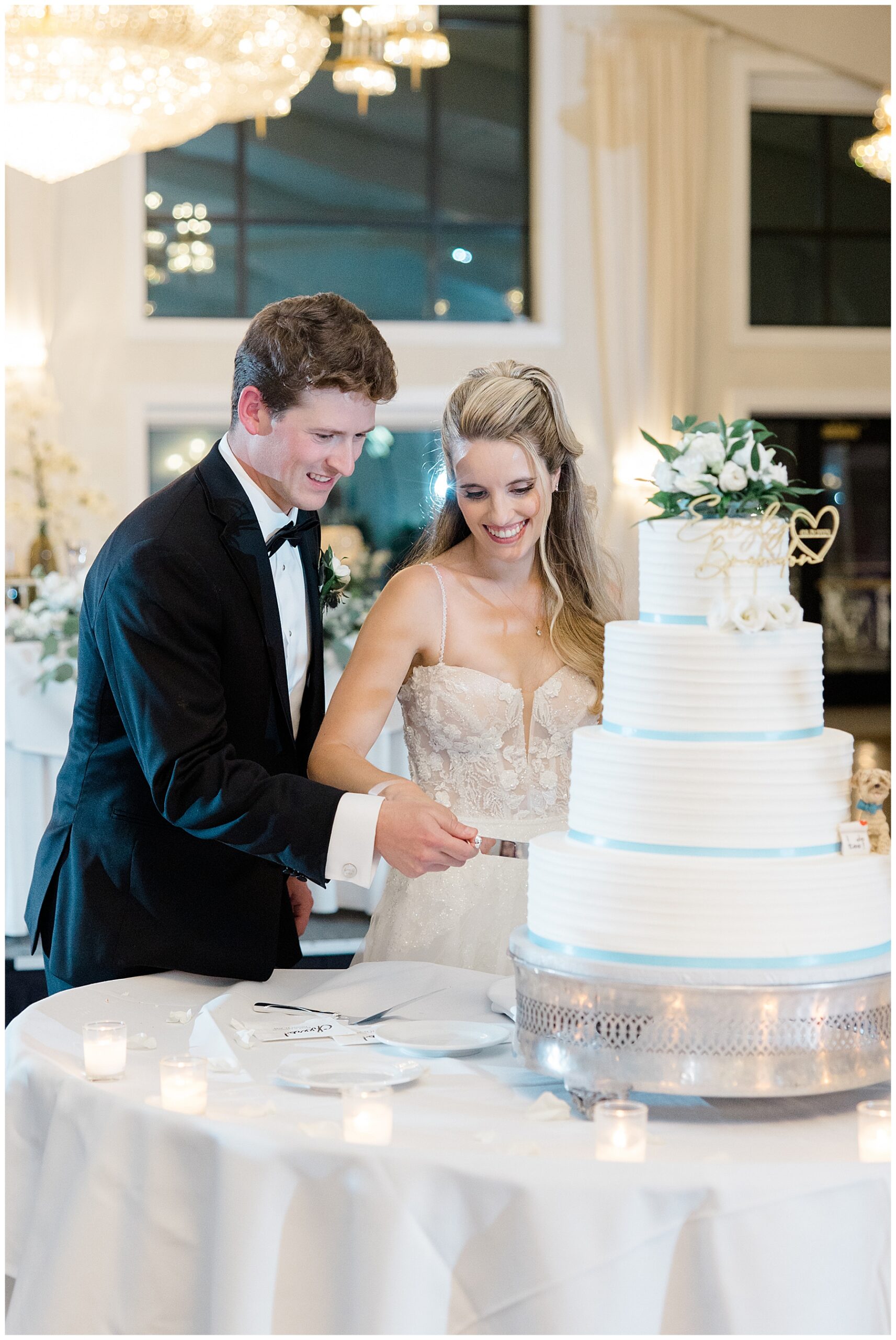 newlyweds cut wedding cake