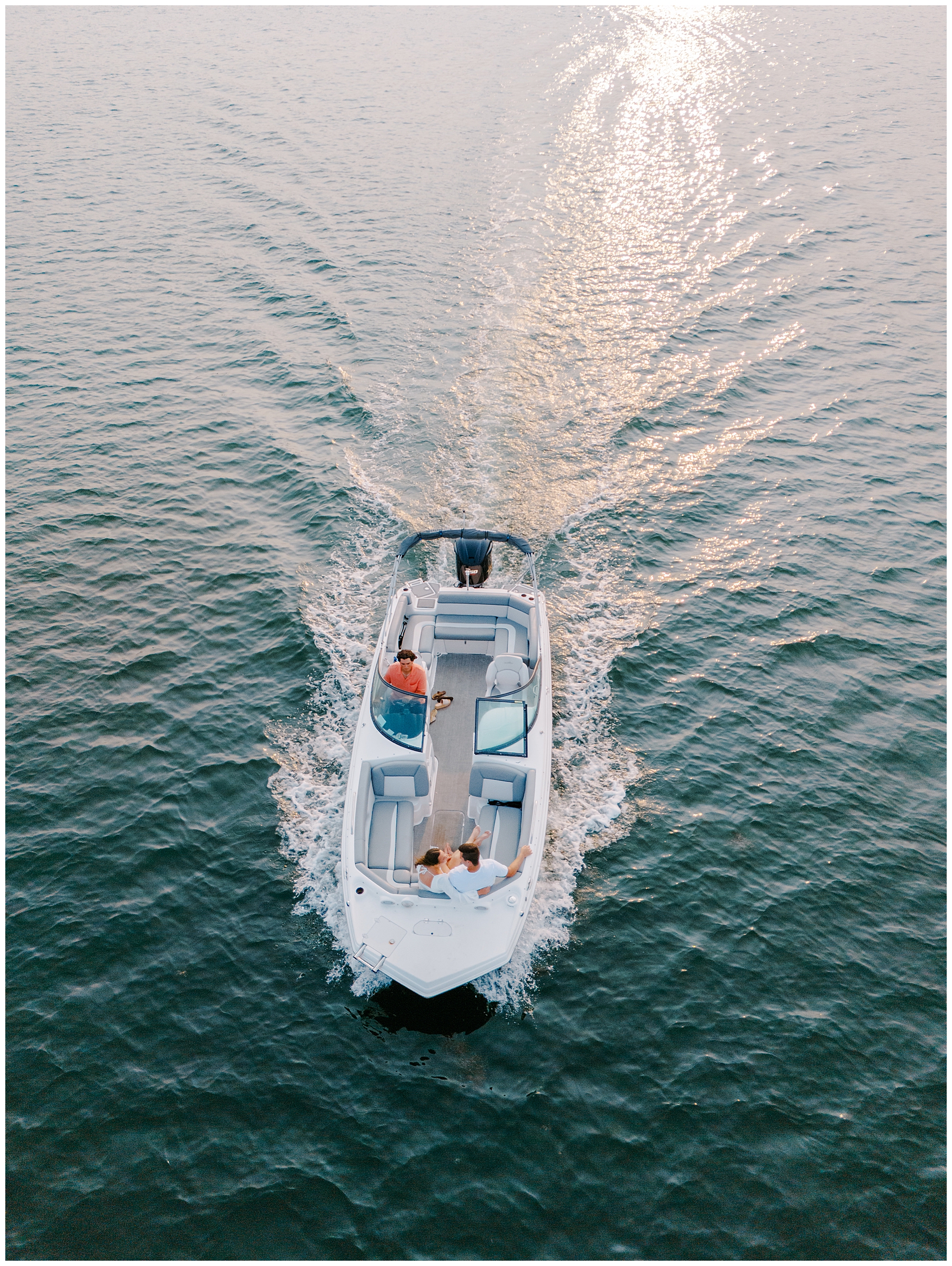 couple on boat during engagement session 
