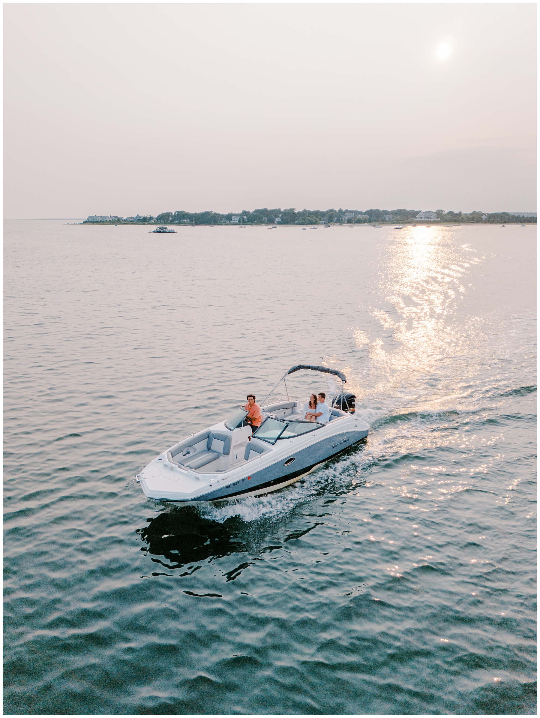 couple on the water in Cape Cod during engagement session 