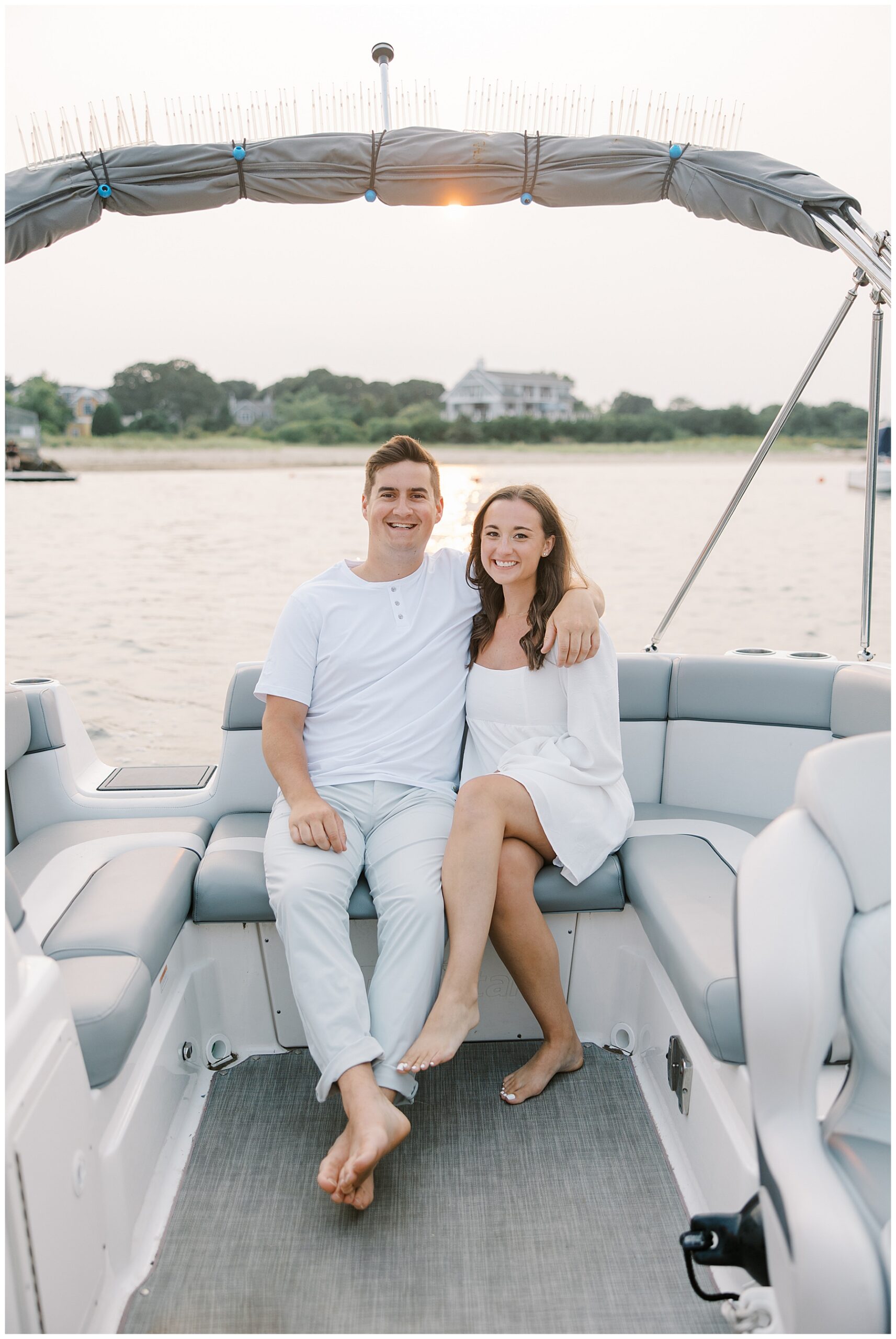 couple on boat during engagement session 
