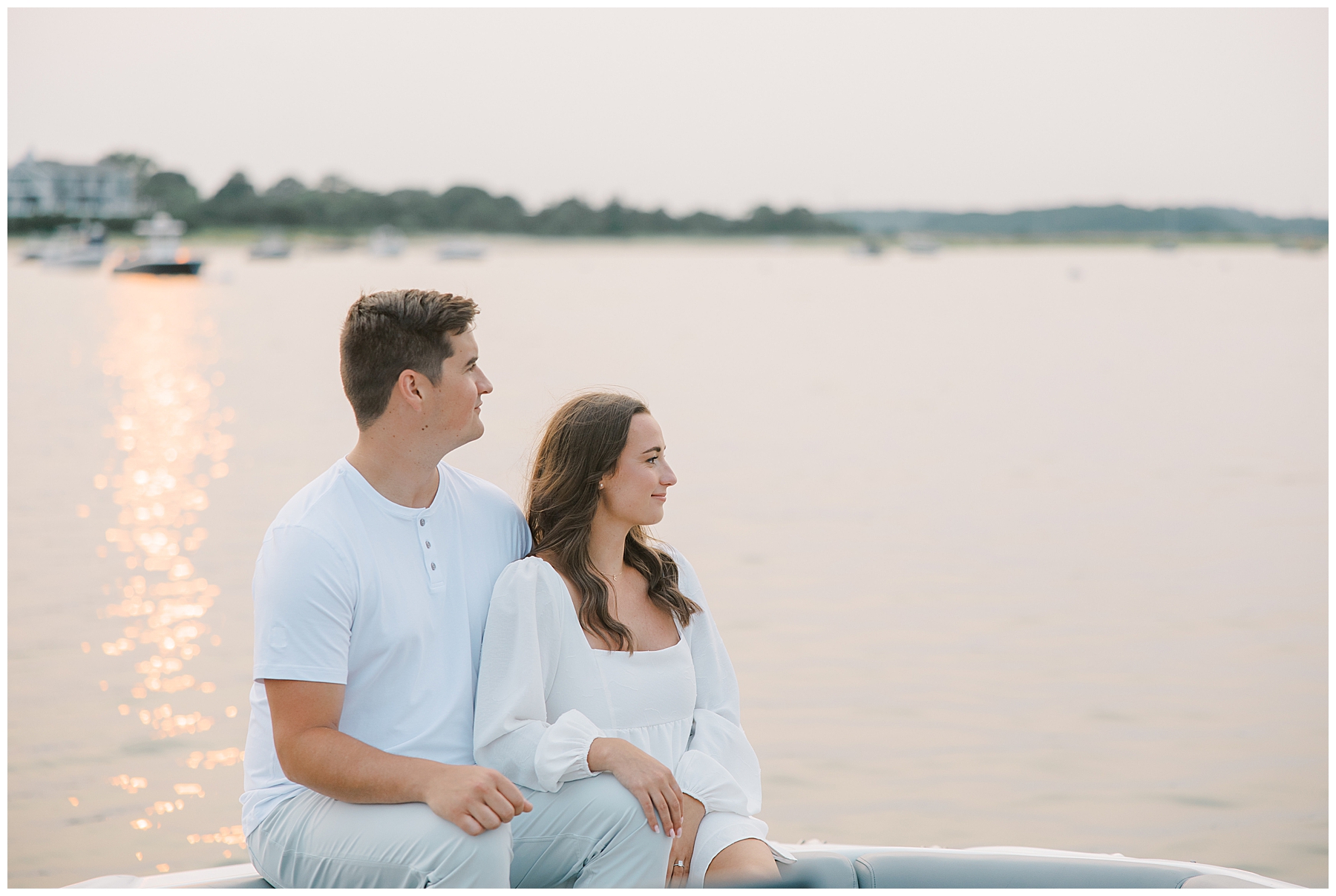 couple enjoy the ocean views on a boat in Cape Cod