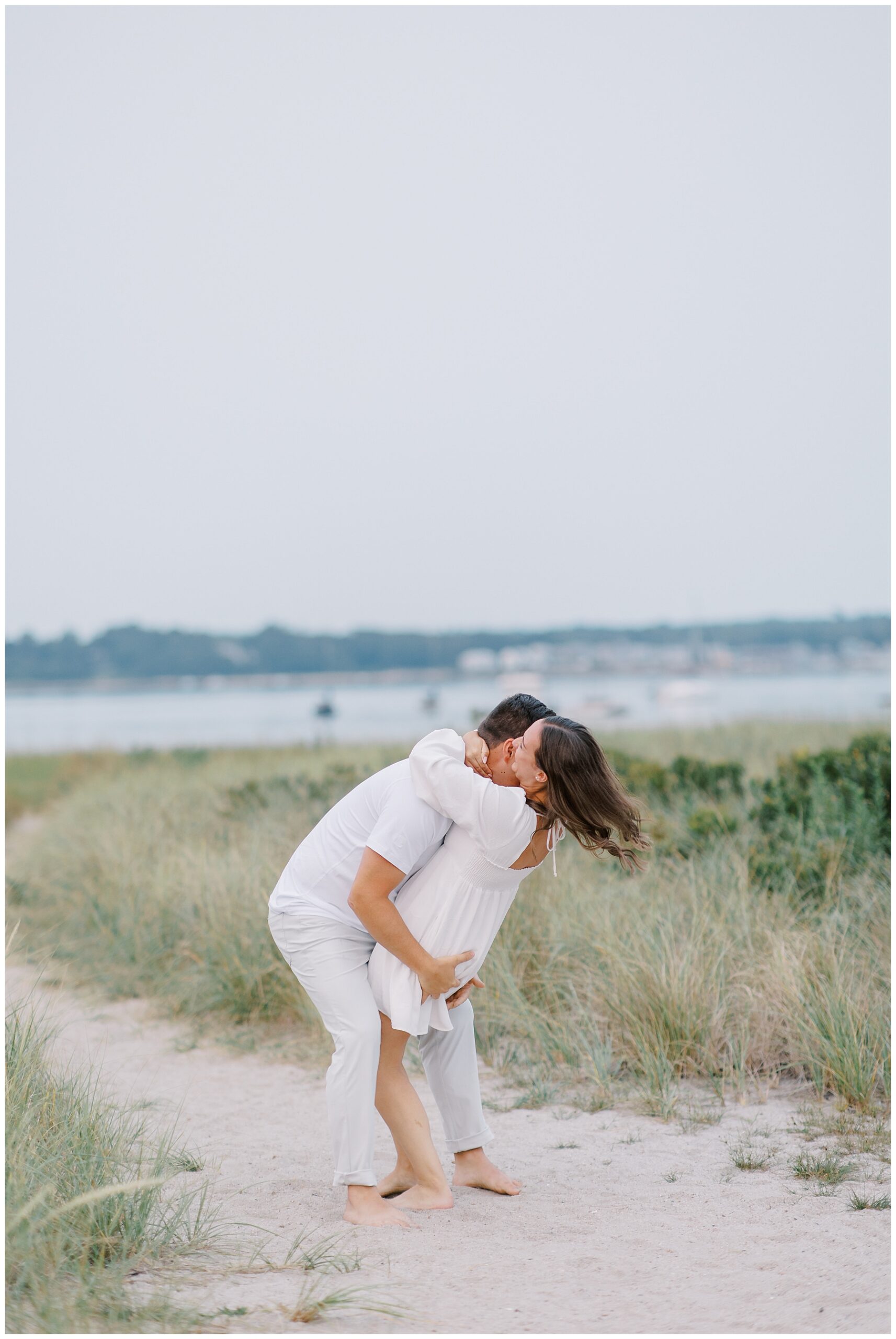 candid engagement photos on Cape Cod beach