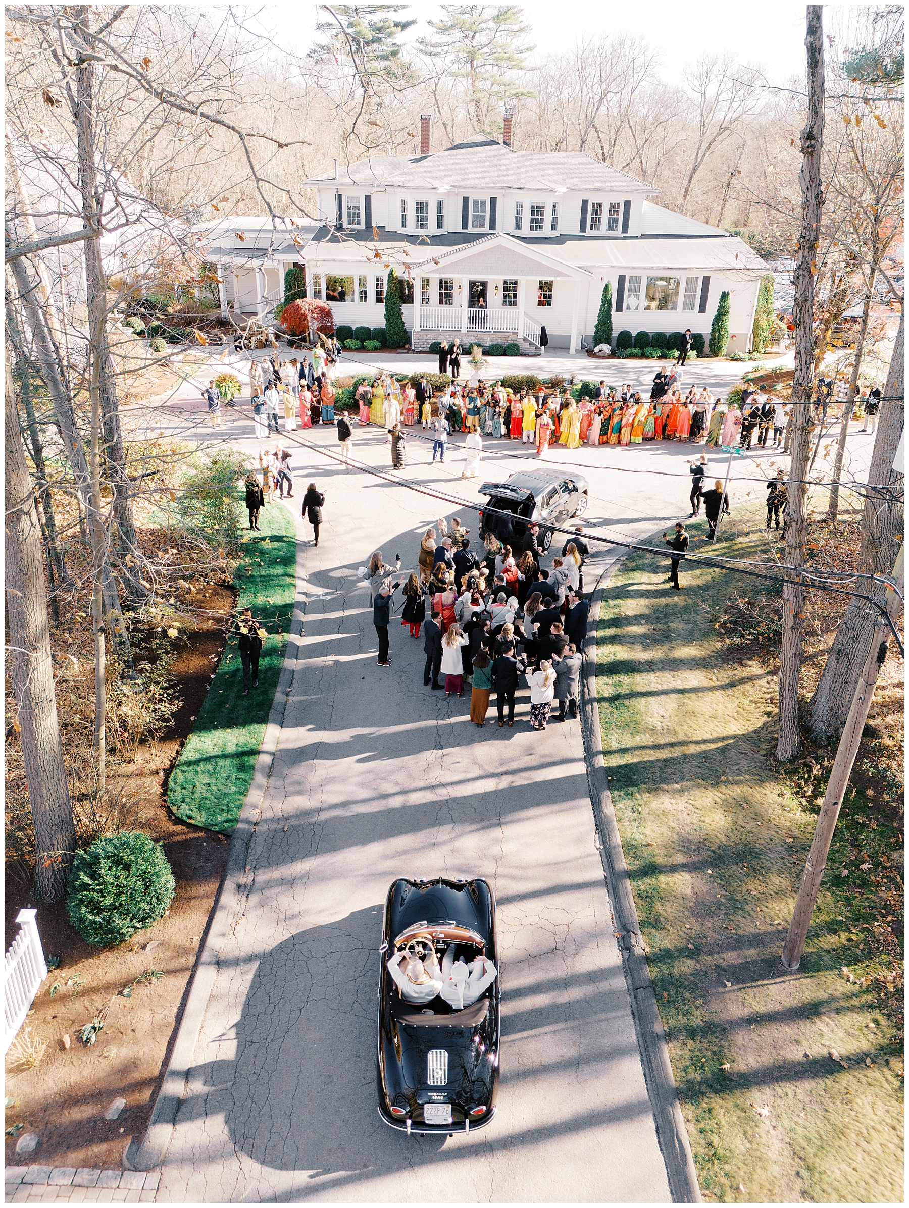 groom arrives at wedding venue during groom's parade