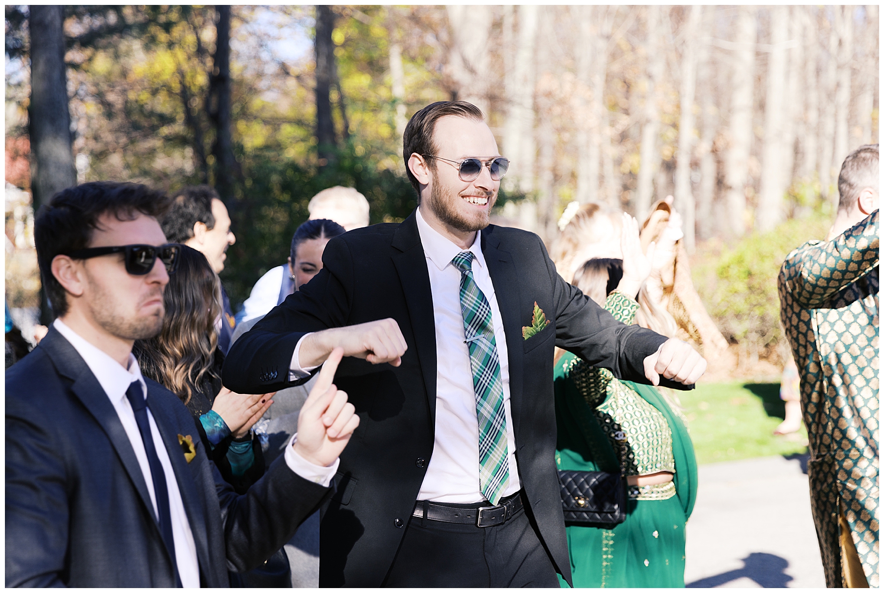 family members greet groom as he arrives