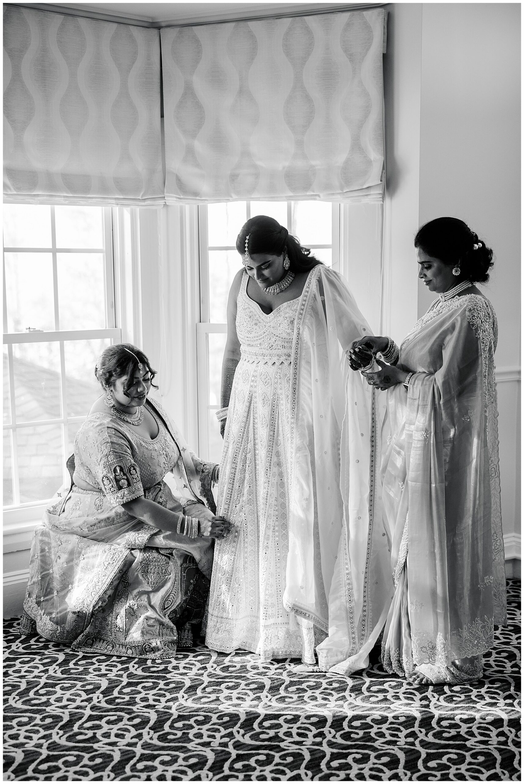 bride getting into saree