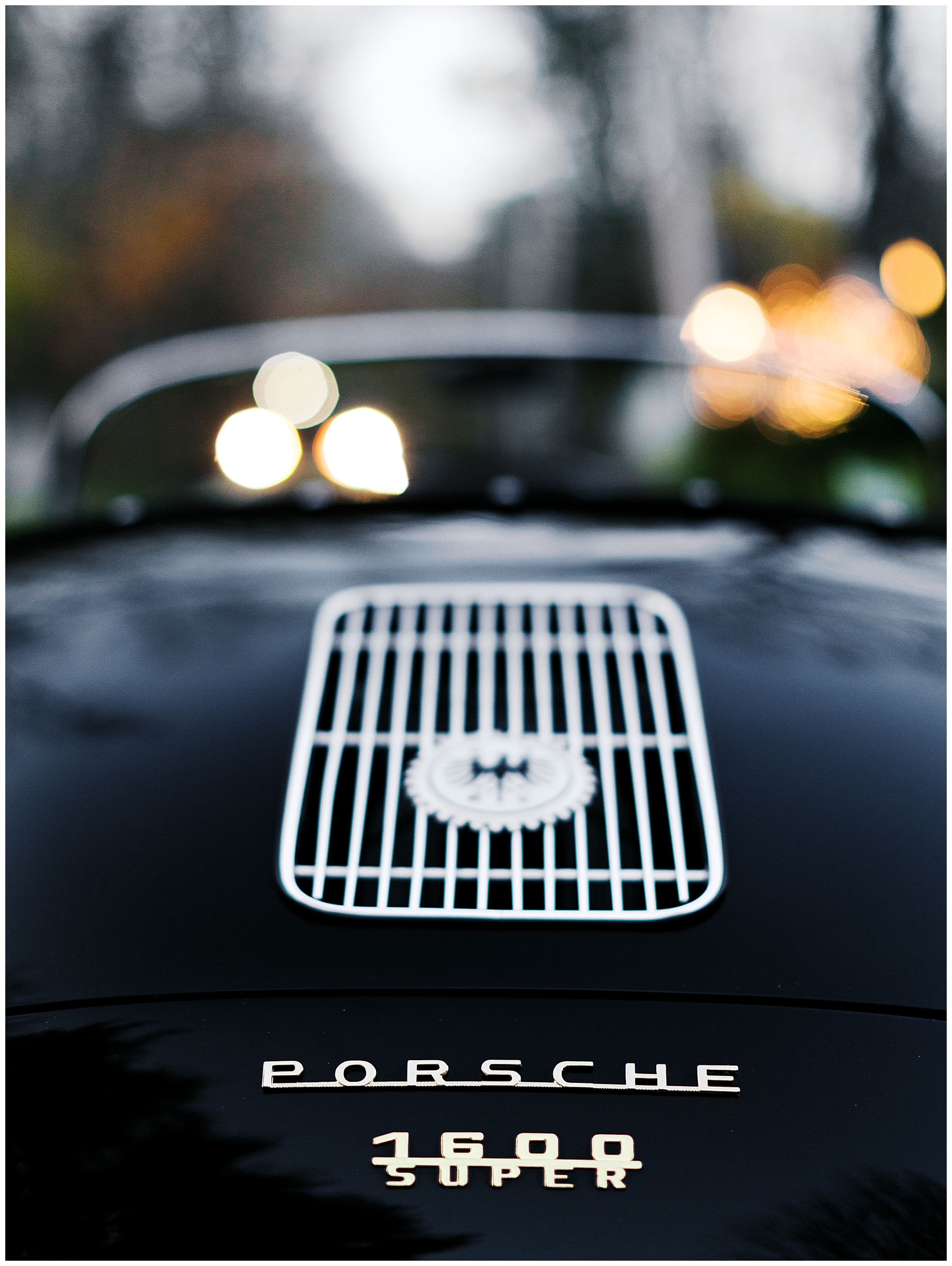 couple driving away in porsche