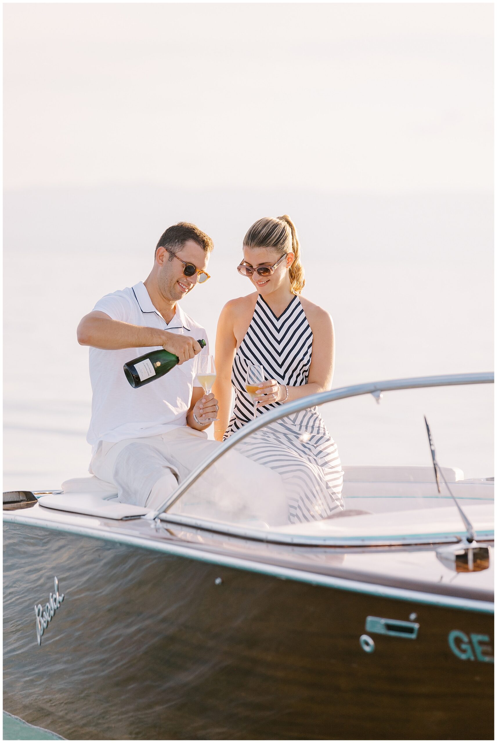 couple enjoying champagne to kickstart their destination wedding weekend in Switzerland