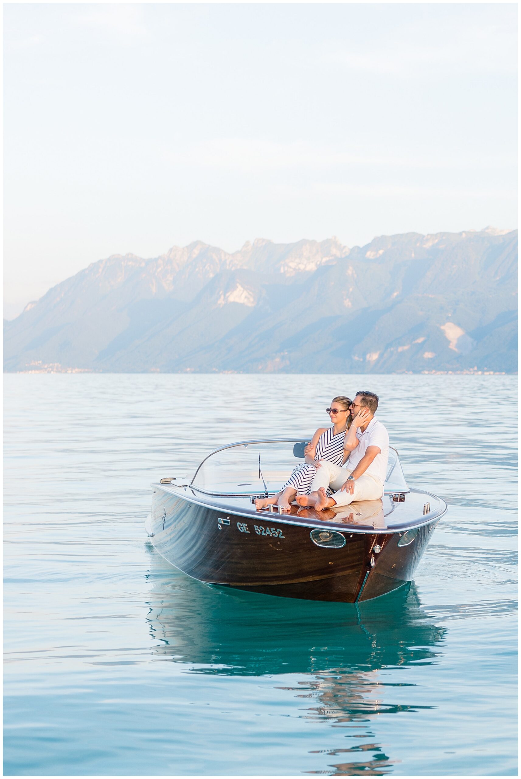 couple enjoying the views and sunset on a boat ride
