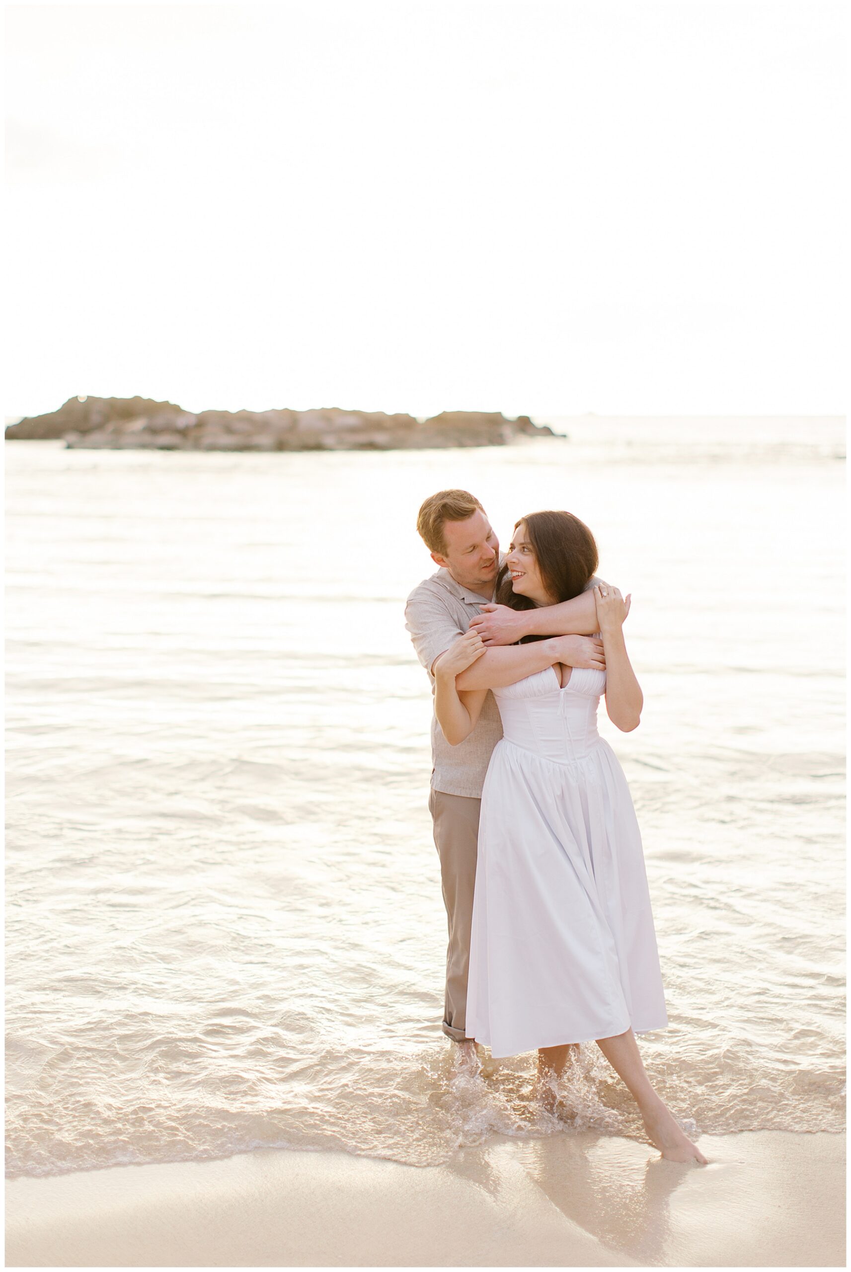 romantic couple portraits by the ocean from O'ahu Hawaii Engagement Session