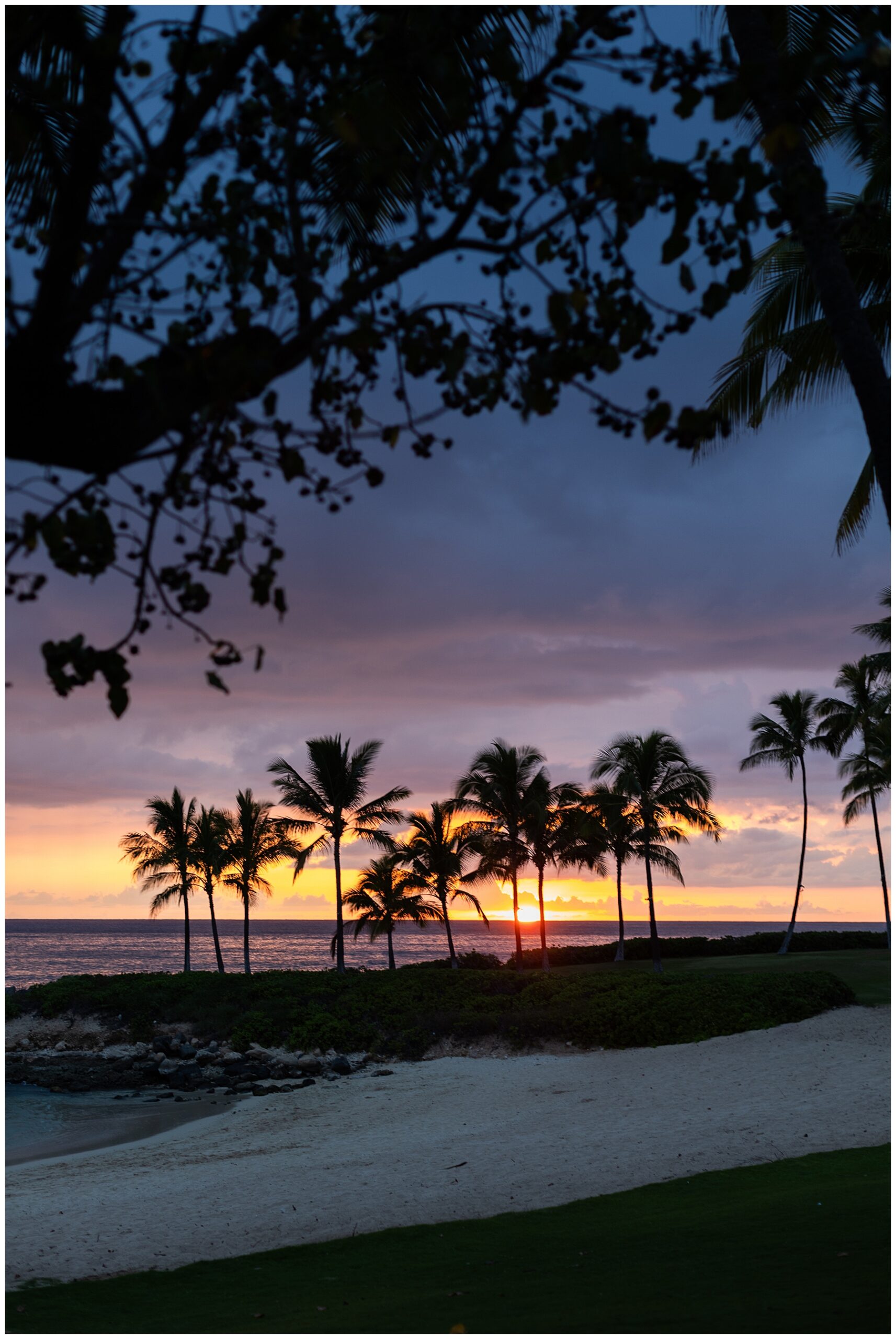 Stunning Hawaiian sunset in O'ahu from destination engagement session