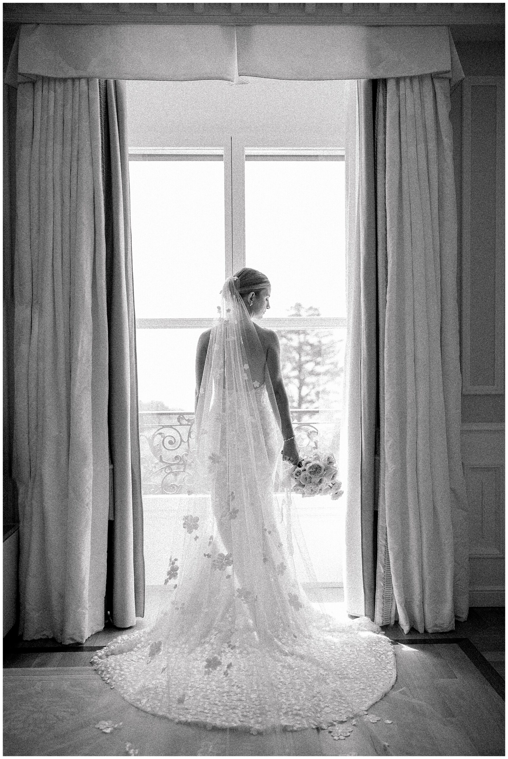 back of bride's wedding dress and veil