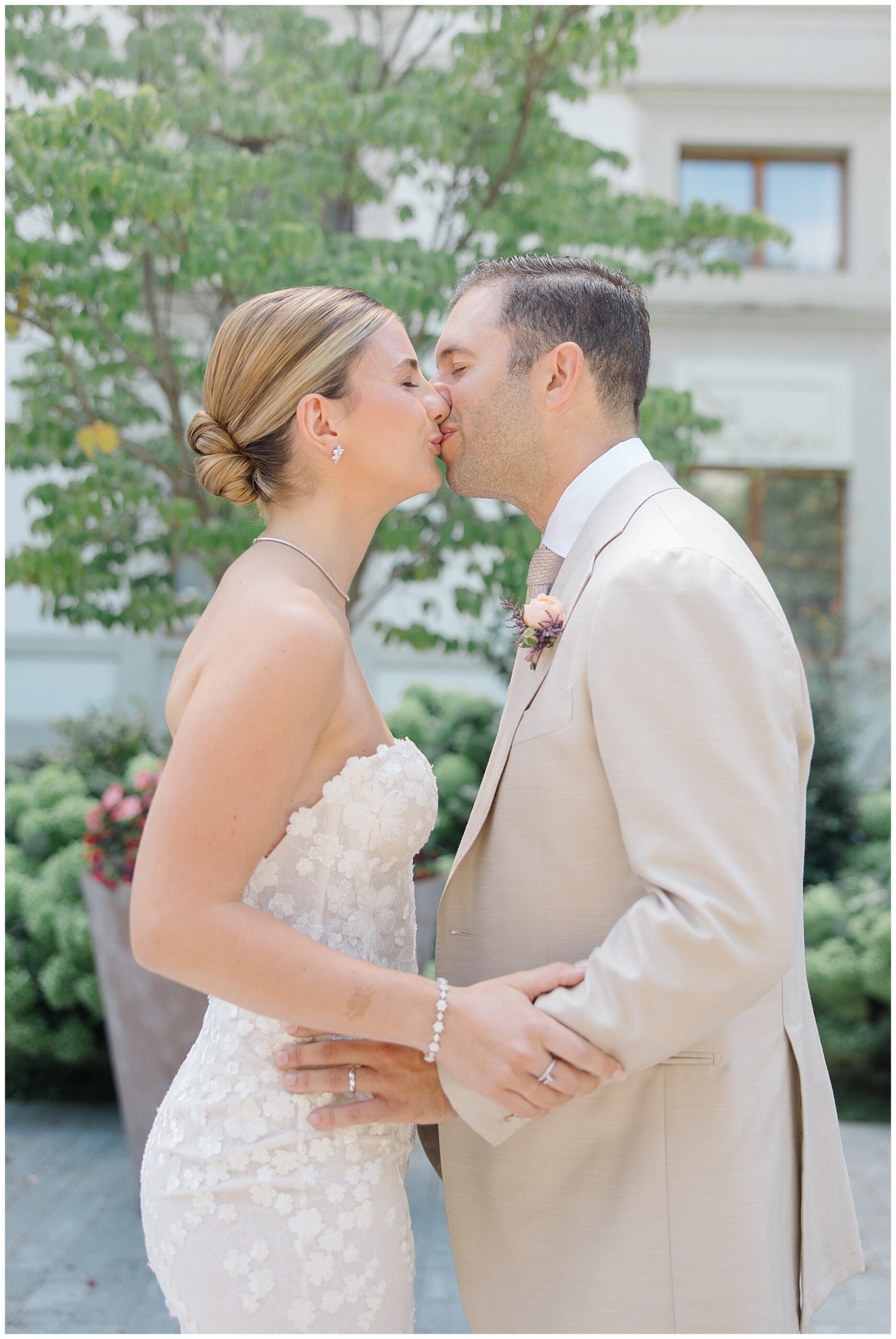 bride and groom kiss