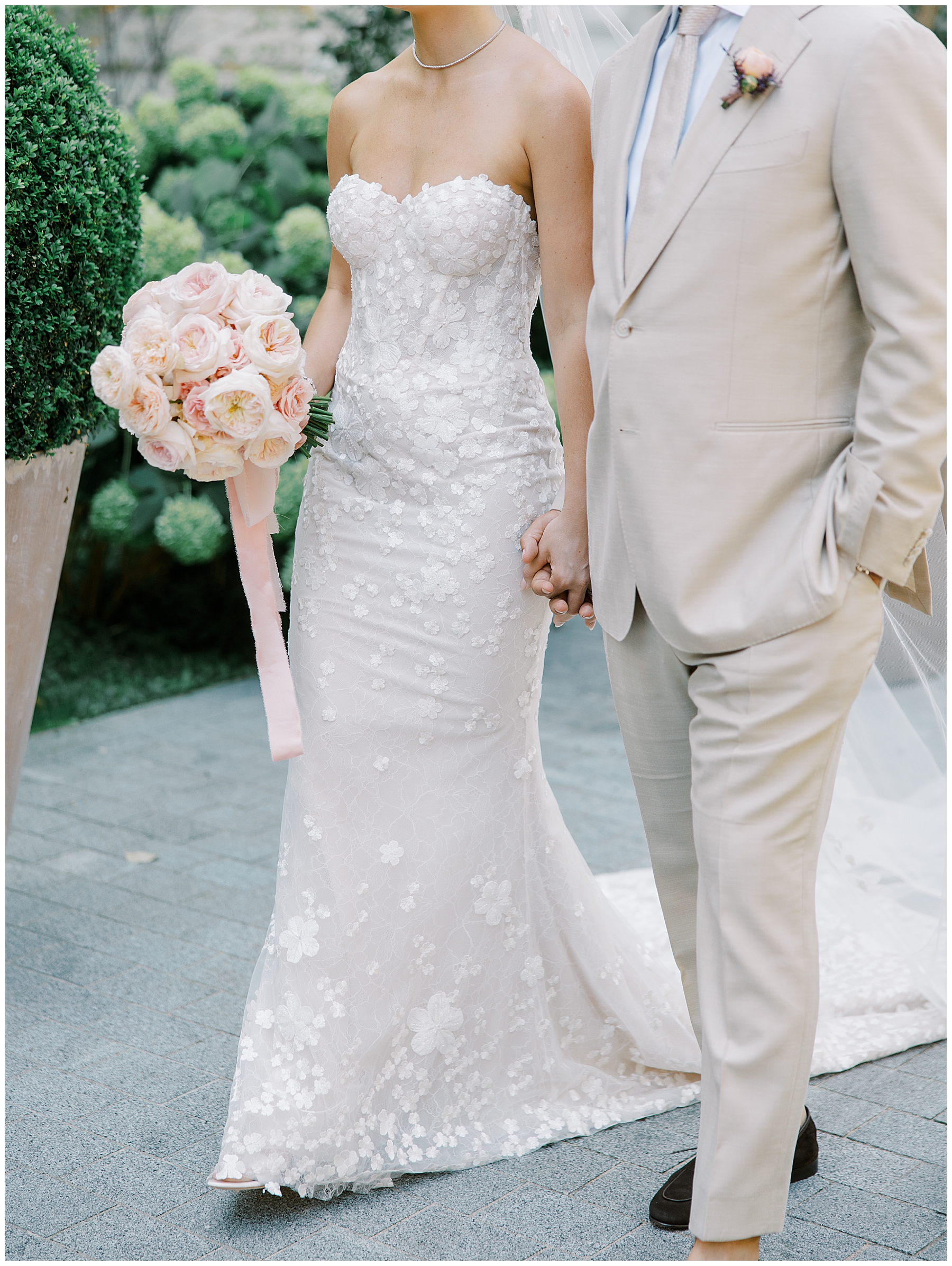 elegant bridal dress and groom's tan tux