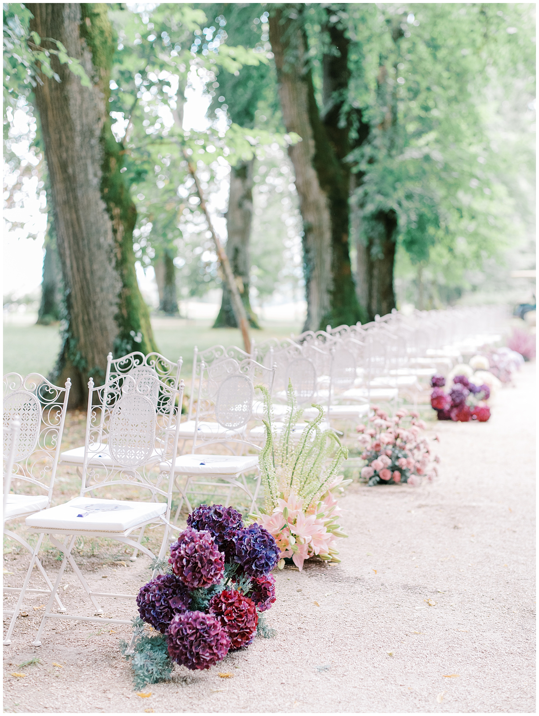 wedding flowers that line ceremony aisle
