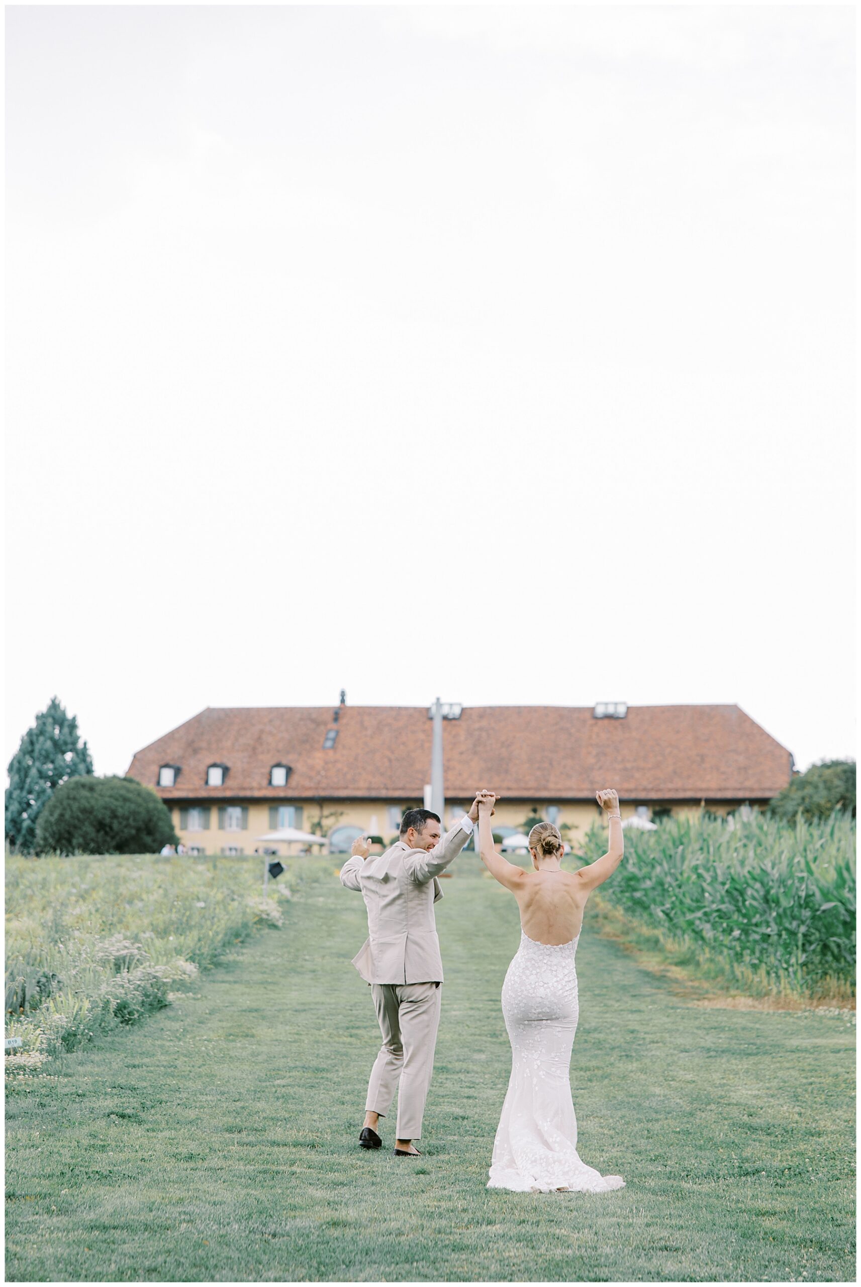 newlyweds celebrate at Luxury Garden Wedding at Porte de Iris in Switzerland