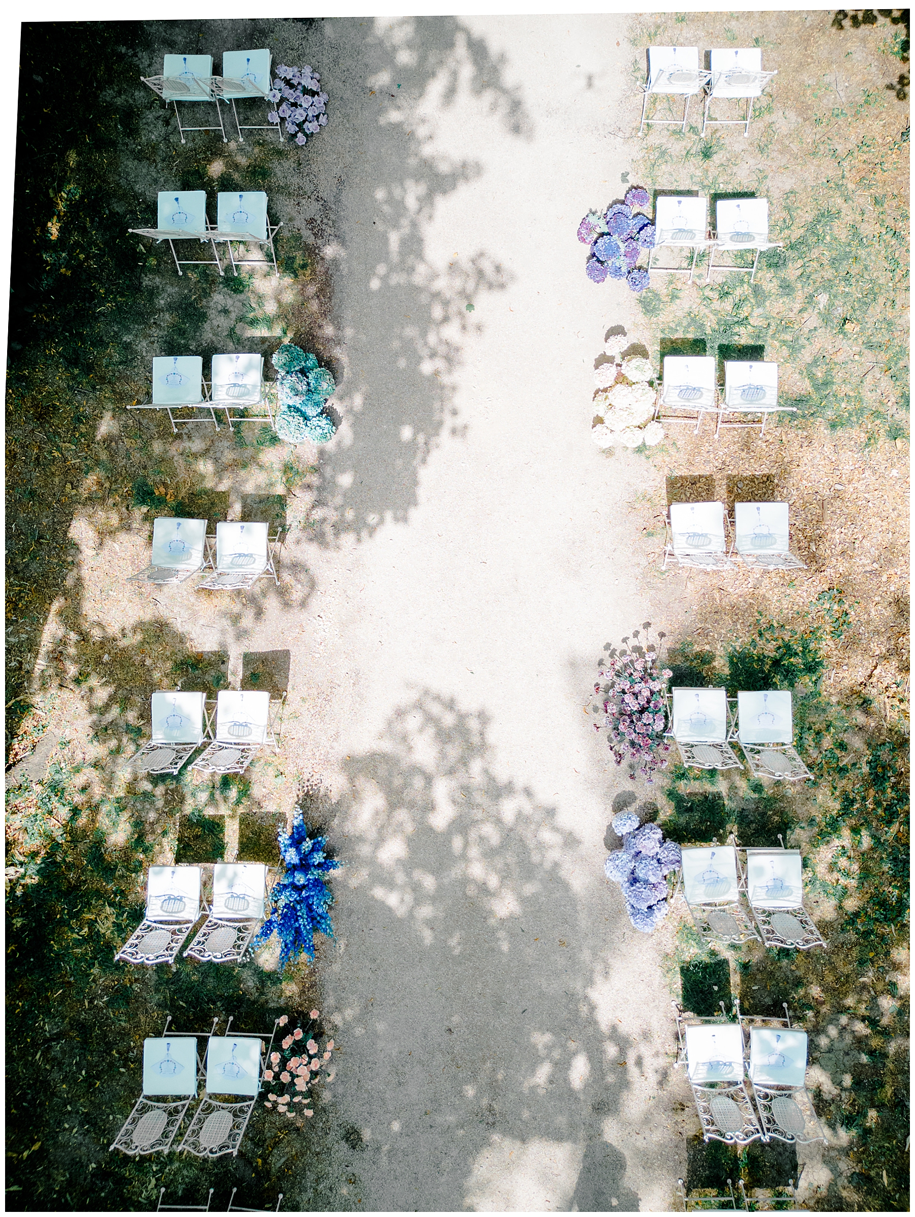 aerial view of wedding ceremony lined with flowers