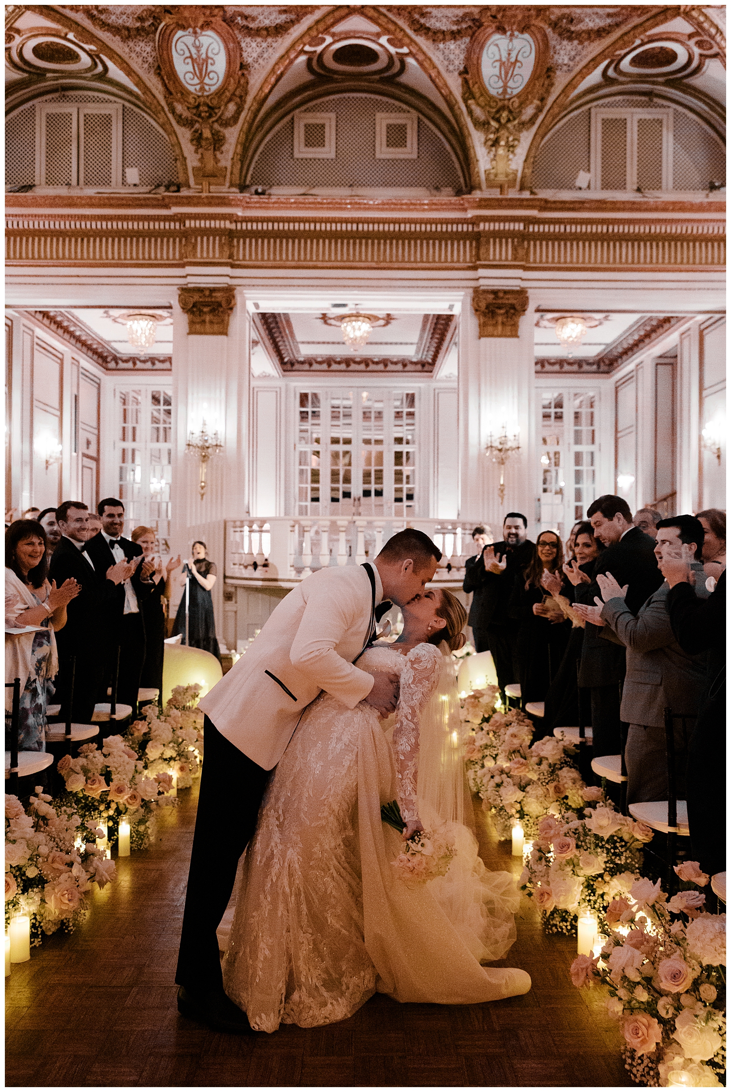 newlyweds kiss as they exit wedding ceremony 