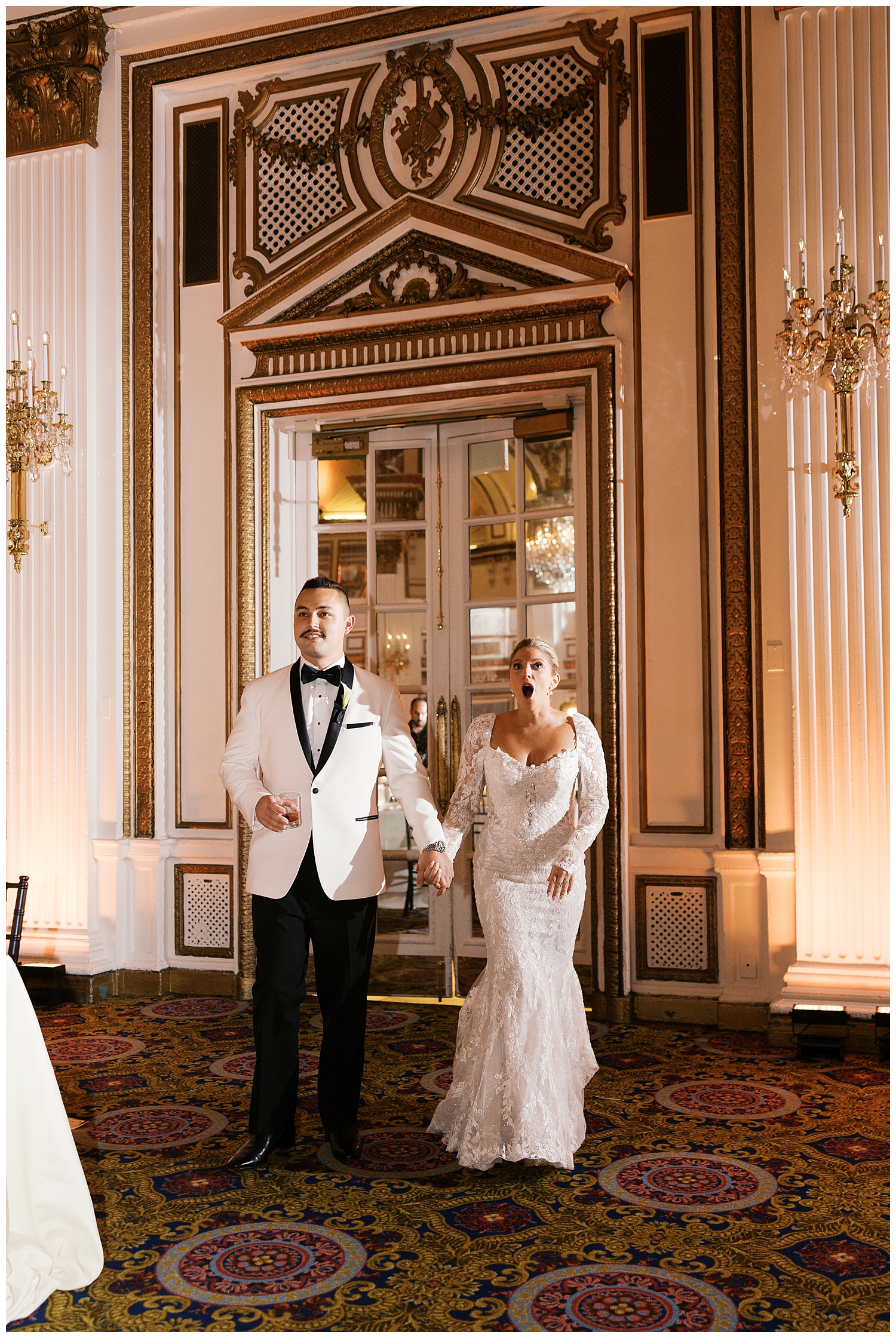 bride and groom view reception for the first time 
