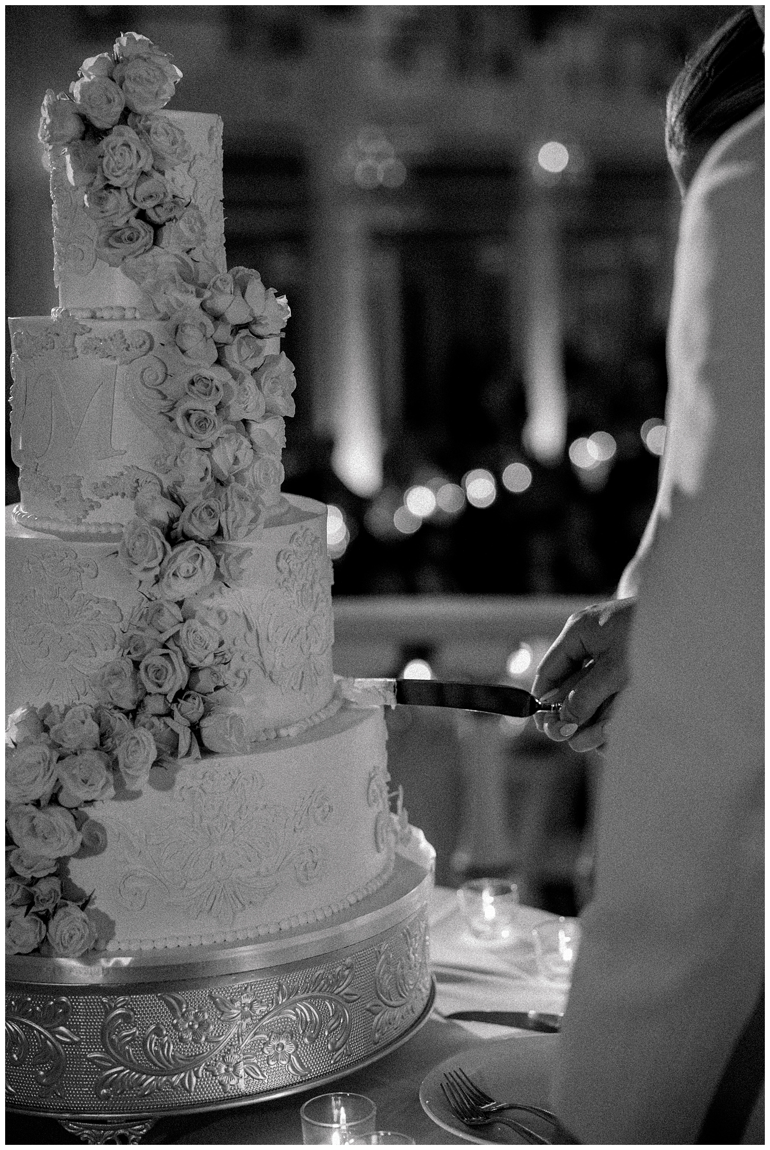 couple cut their wedding cake 