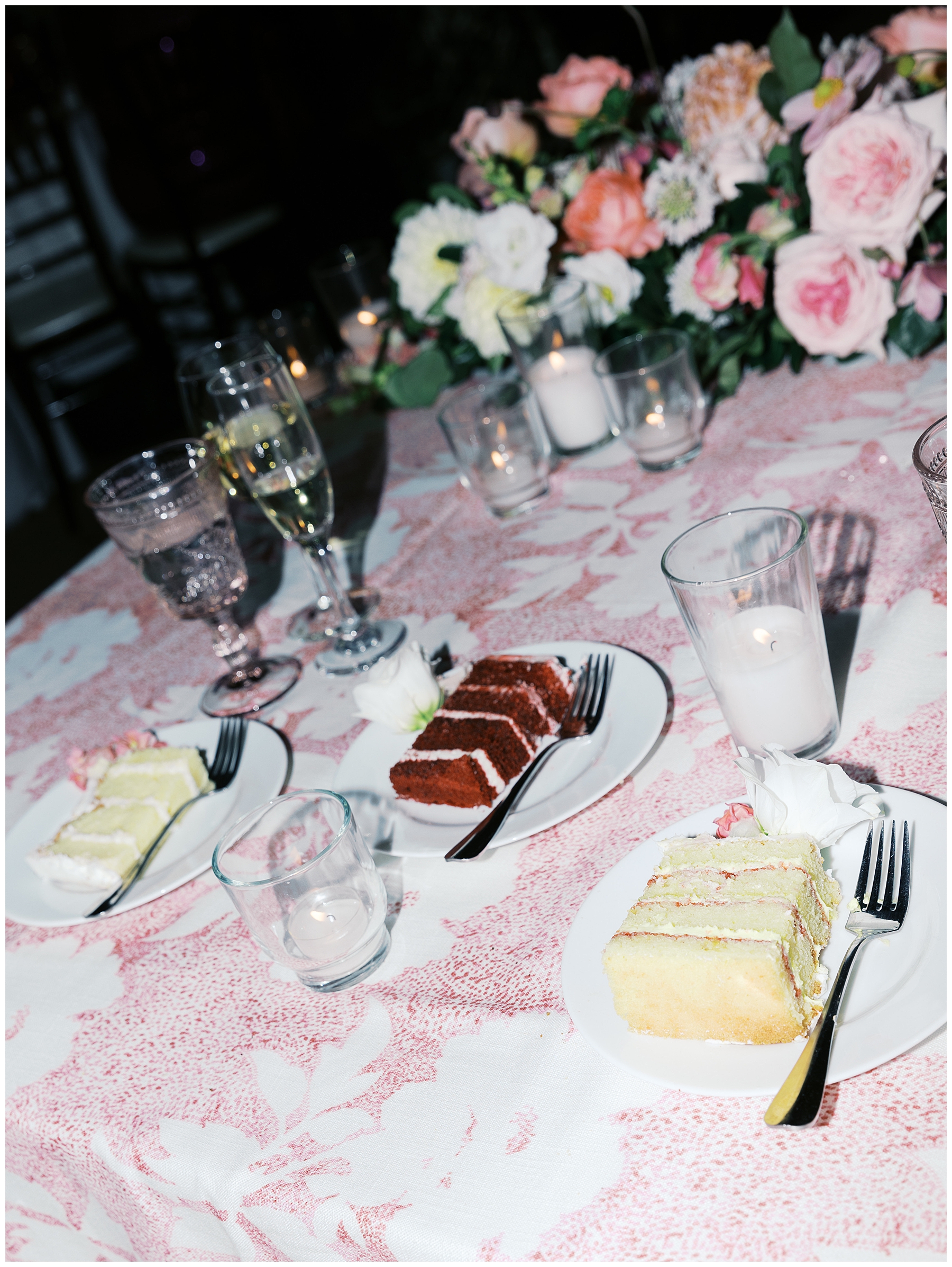 pieces of wedding cake cut on plats at wedding reception