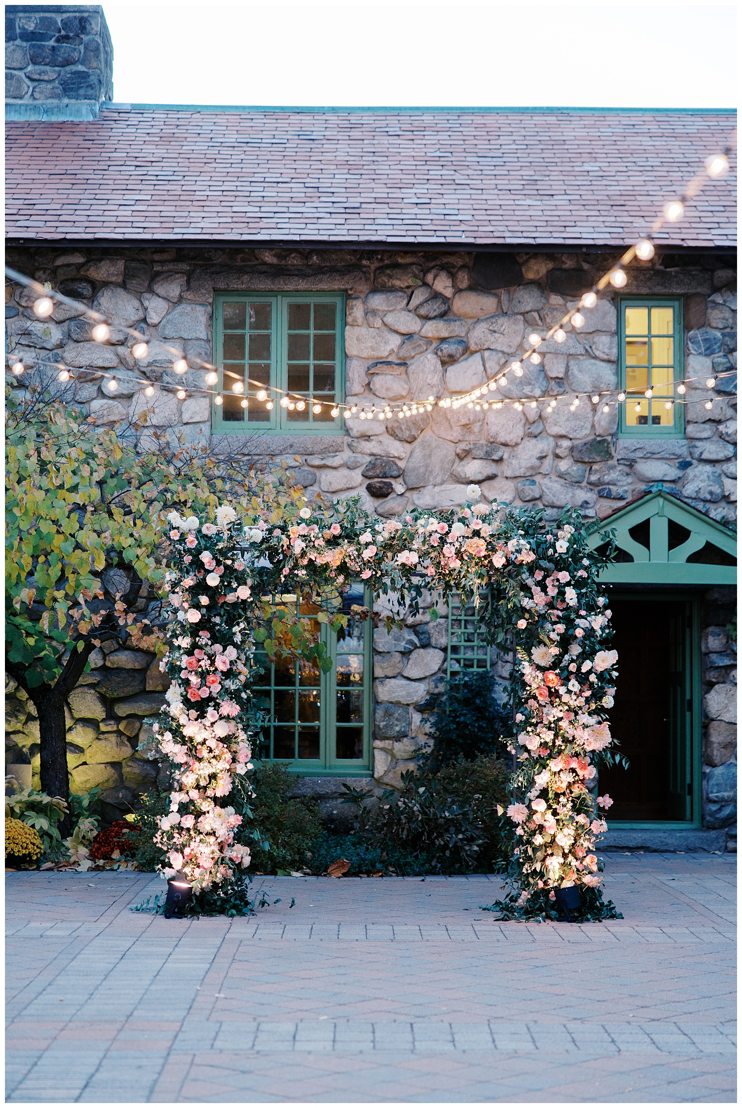 twinkle lights decorate courtyard at Willowdale Estate