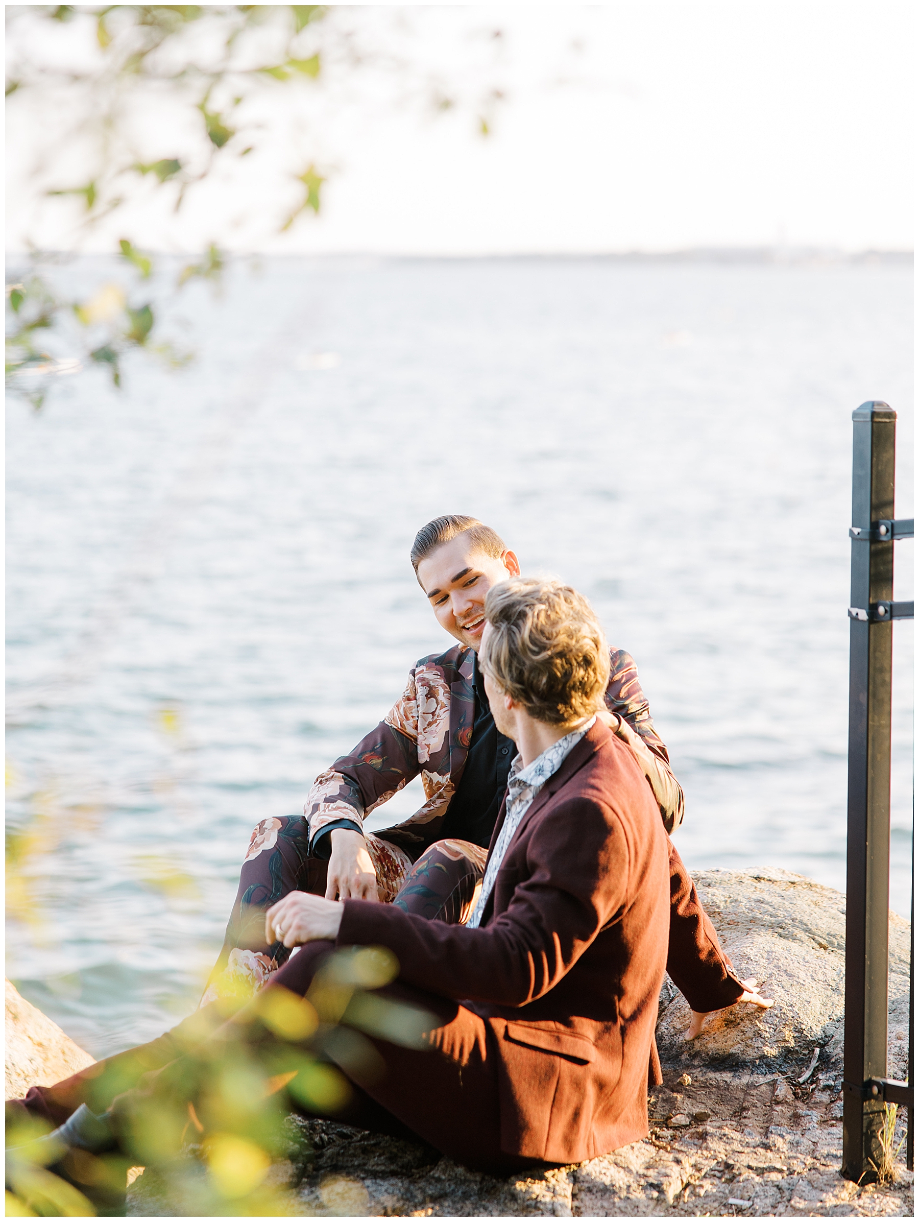 couple sit by the water at Intimate Misselwood Events Wedding on the North Shore