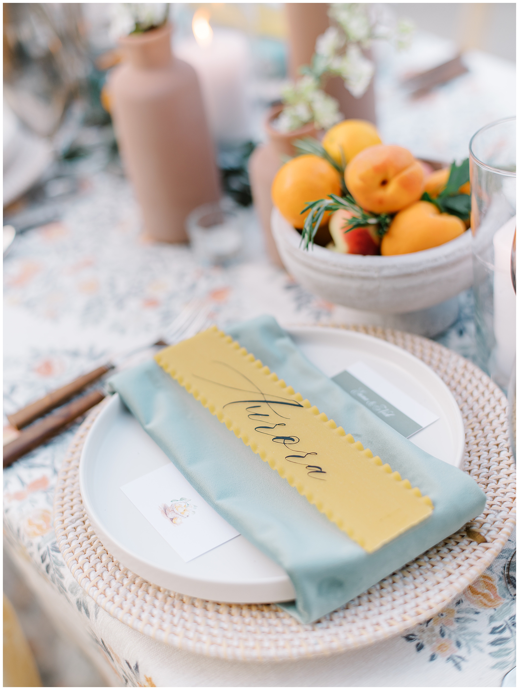 elegant place setting at reception with light yellow and dusty blue details